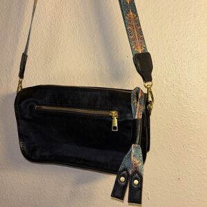 Like new black vegan leather 8 x 6“ roughly Crossbody bag with adjustable patter